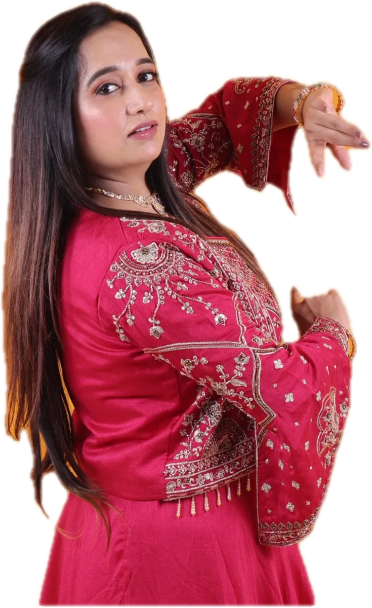 Diimple Pancholi in a garba pose